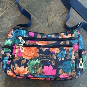 Ruimoti brand NWOT floral purse